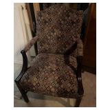 Antique upholstered armchair