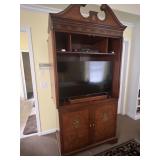 Armoire converted to entertainment center