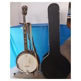 Four string banjo with case and stand see