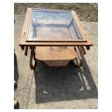 Glass topped side table