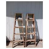 Two wooden ladders