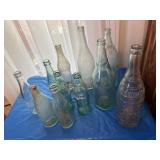 11 vintage soda bottles, incl. Missouri ribbed