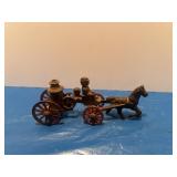 Vintage cast iron horse drawn, fire pump wagon