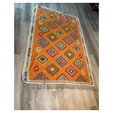 Wool rug appears to be handmade. Measures. 53ï¿½ x