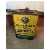 Vintage D&D creosote oil can. About 1/4 full.