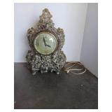 Vintage MCM vomit clock it is electric and it
