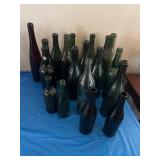 19 old wine bottles. All have indented bottom