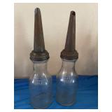 2 vintage glass oil jars with spouts