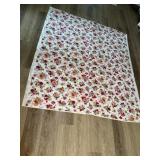 Handmade tacked quilt measures 67 x 77 appears to