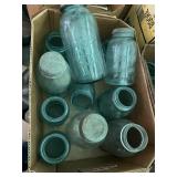 Several canning jars most are green glass ball