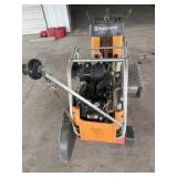 Husqvarna walk behind concrete saw. We started
