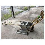 Manual highway tape applicator