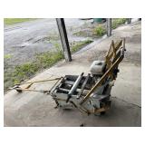 Pavement tape applicator. Takes ether to start