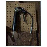 Rake and grease gun