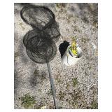 Dip net, baskets, and bucket of plastic worms,
