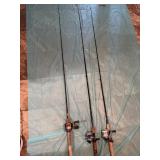 Three fishing rod and reels, including Daiwa,