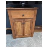 Farmhouse style accent cabinet. Books not