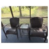 Two resin wicker chairs and side table as shown