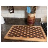 Cutting board, utensil holder, and utensils as