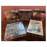 5 new jig saw puzzles in box and wrapper.
