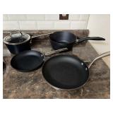 SCANPAN Cookware includes two sauce pans and two