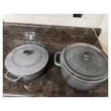 2 Staub Dutch ovens. Appear to be new. Gray. 24 &