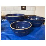 Three blue crock bowls the small one is stamped
