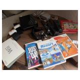Wii gaming device and games. Notice the Super