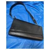 Black Calvin Klein purse. Appears to be gently