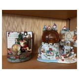 Two battery operated snow globes