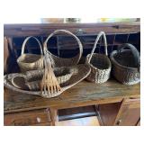Baskets. Including hand on nest basket.