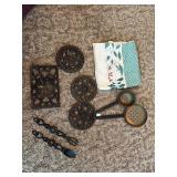 Cast iron trivets, card, table, size tablecloth,