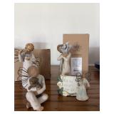 Four Willow tree figurines