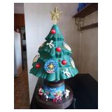 Electric rotating Coca-Cola Christmas tree . It