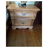 Pair of Basset nightstands. The one is in pretty