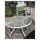 Round patio table and chair just needs a good
