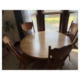 Round dining table and floor chairs