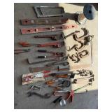 Rigid pipe, wrenches, sea clamps, bolt cutters,