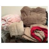 Three throws and one twin size comforter