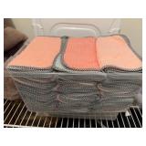 Tote of fleece dish cloths, mesh, pop-up pampers,