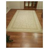 Large area rug 60 in by 96 in