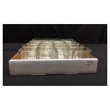 A box of 20 glass votive holders