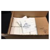 Box of napkins and forks