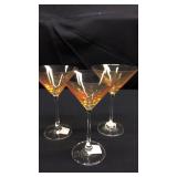 3 orange martini glasses