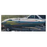 1999 Sea Raider ski boat & 1972 boat trailer.