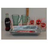 Lot of Coca-Cola drinking glasses and metal trays