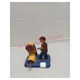 Girard toy, wind up metal grinding wheel toy