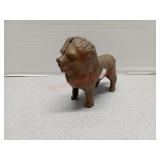 Gold colored cast iron Lion coin bank