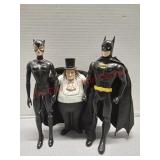Batman, cat woman, and the penguin action figures