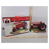 Farmall 560 Resin Tractor on Sculptured Base 1:16